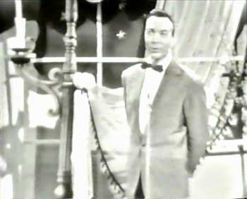 Andre Claveau singing at Eurovision 1958